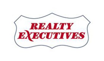 Logo displaying 'Realty Executives' in red text within a shield outline.